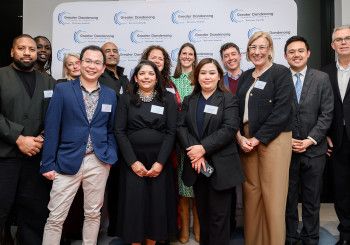 A group of people smiling