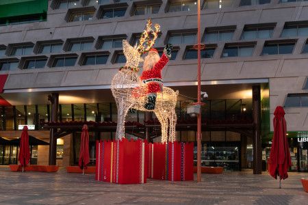 santa riding a reindeer