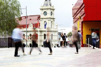 People walking in Harmony Square