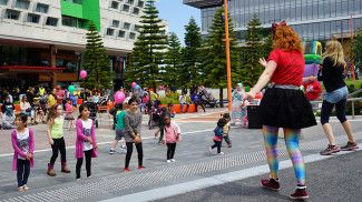 Harmony Square - event crowd with performers