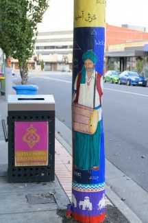 Decorative Power Poles on Foster Street 'Welcome' by Artist Sohail Yamin