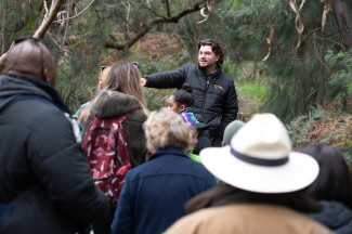 A ranger leading a nature walk