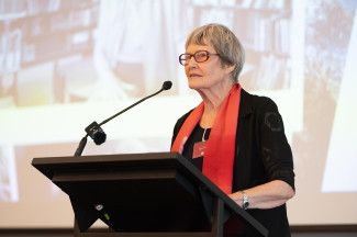 A speaker at the Merle Mitchell AM Memorial event