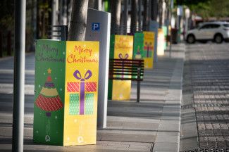 Christmas decorations above businesses in Dandenong