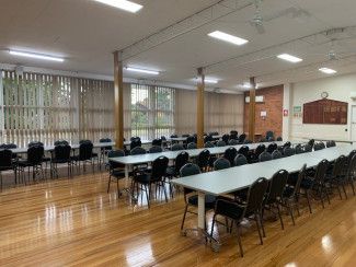 Interior of hall with tables and chairs