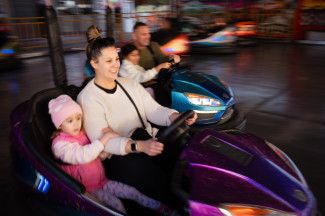 Attendees in dodgem car