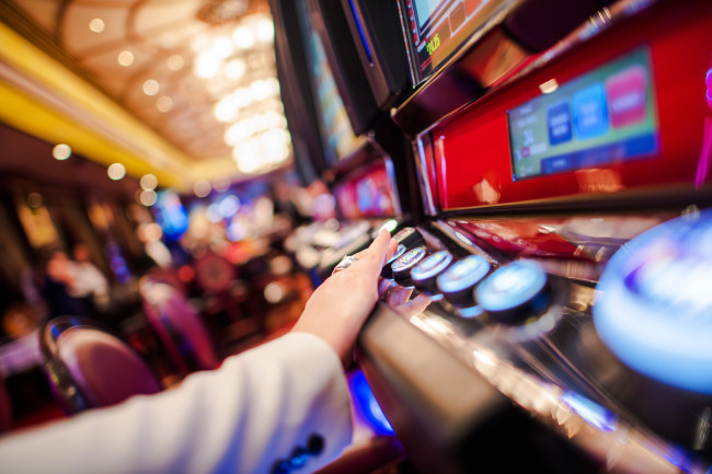 person playing gambling machine