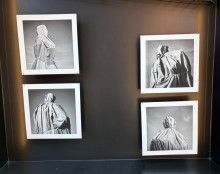 Photos hanging in the Garnar Lane windows.